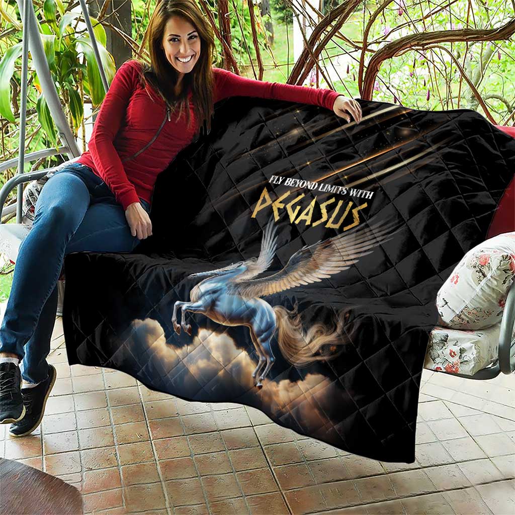 Black Pegasus quilt with blue winged horse graphic, draped over a couch
