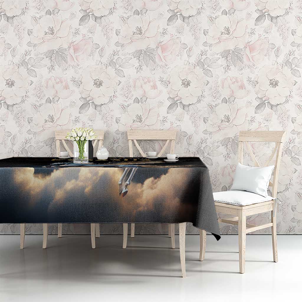 Black tablecloth on long dining table with cloudy Pegasus print