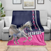Horse racing blanket on a sofa with Pegasus graphic, navy and pink plus gem-trim border