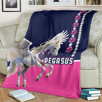 Horse racing blanket draped on a couch, Pegasus graphic with navy, pink, and gem trim