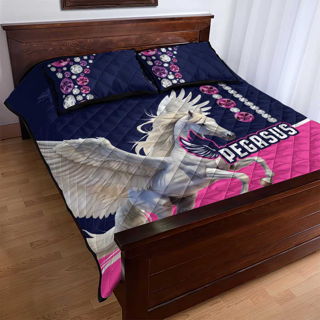 Pegasus quilt bed set with navy and pink diamond quilting and winged horse design.