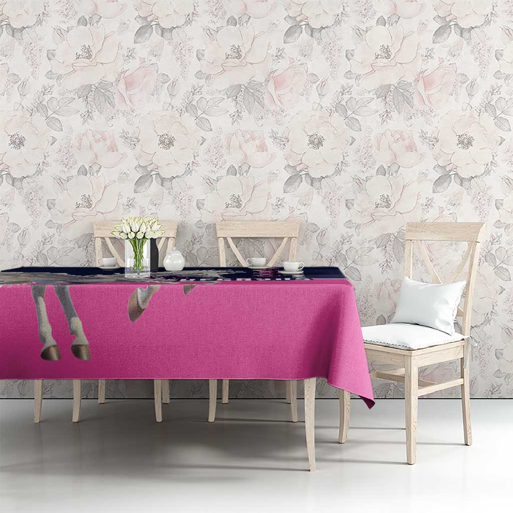 Pegasus tablecloth with pink center and navy border, displayed on dining table