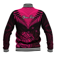 Pink and black tribal-pattern baseball jacket, back shows 'Your Text' and striped rib trim