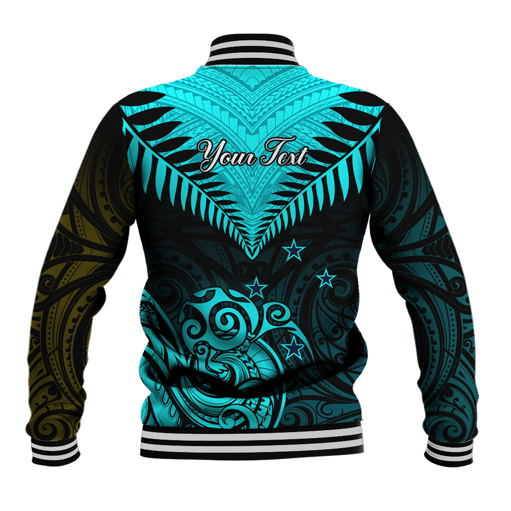 Turquoise and black baseball jacket with ribbed stripes, front button, and swirling moko-style art