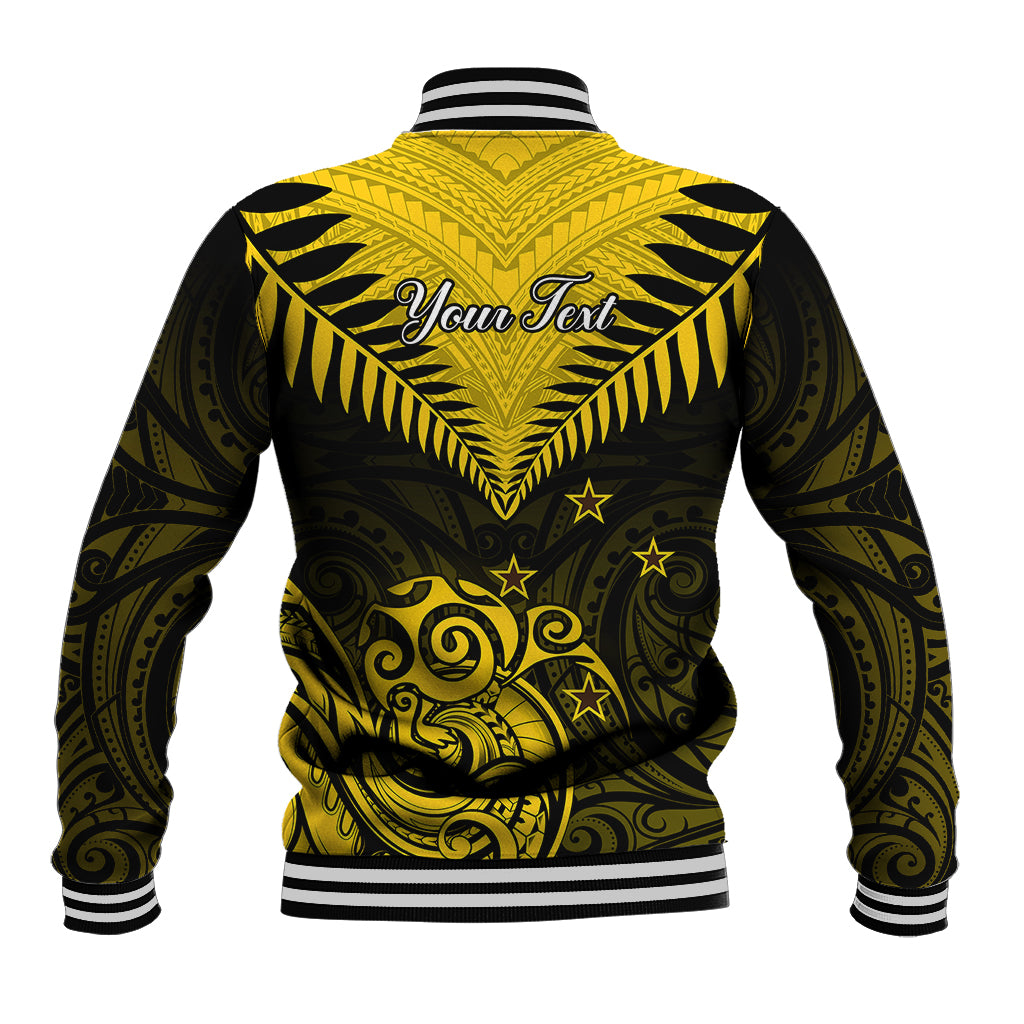 Yellow and black baseball jacket, back graphic with Maori tribal motifs and fern