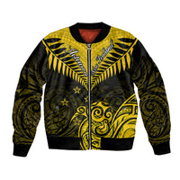 Yellow and black bomber jacket with full zip and Maori-inspired kiwi fern graphics