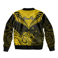 Yellow and black bomber jacket with back Maori kiwi fern graphic and ribbed hem