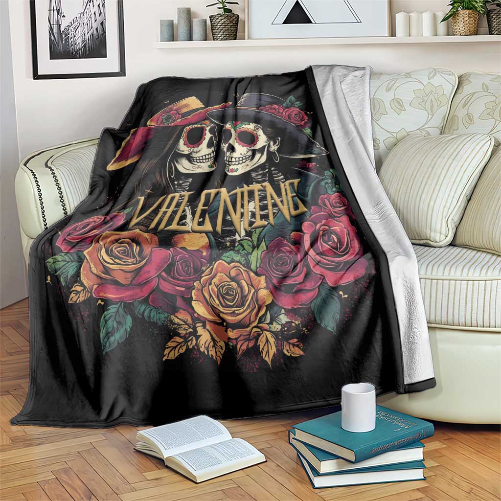 Black Valentine blanket with two sugar skulls wearing hats, surrounded by roses and VALENTINE text