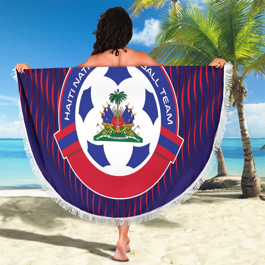 Round blue beach blanket with red stripe pattern, large team logo, and white fringe.