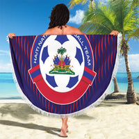 Round blue beach blanket with red stripe pattern, large team logo, and white fringe.