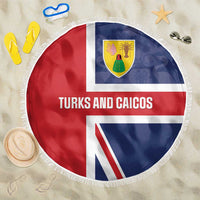 Round beach blanket with Turks and Caicos text, red white and blue halves, fringe edge