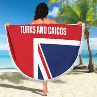 Round beach blanket held up in air, Turks and Caicos text and flag colors, fringed edge