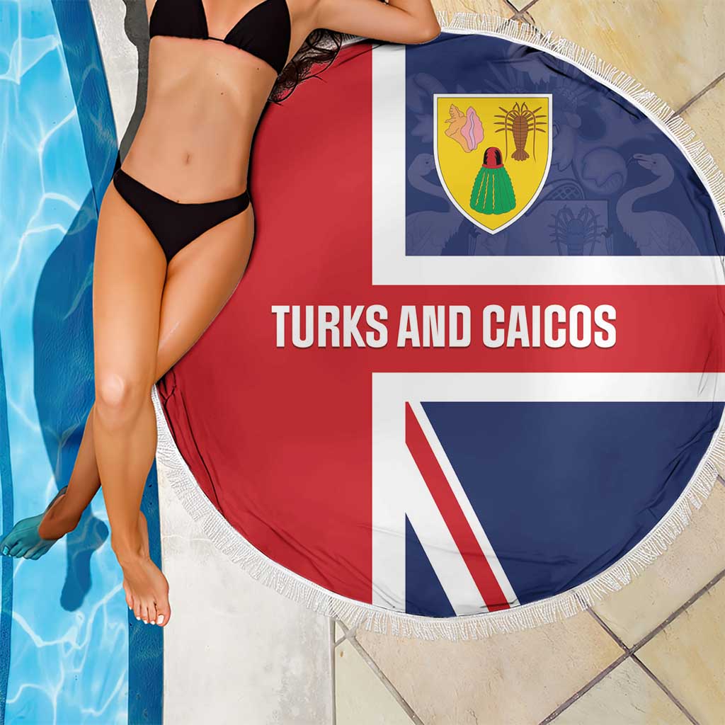 Round beach blanket over pool edge, Turks and Caicos flag print, red white blue fringe