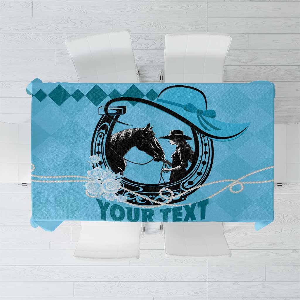 Blue tablecloth with horse emblem and centered 'YOUR TEXT' print, rounded corners