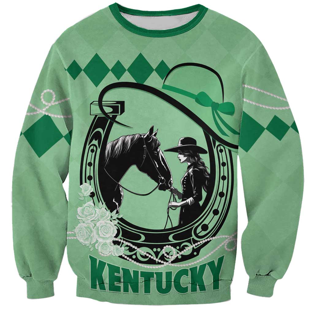 Green crewneck sweatshirt with horse and cowboy graphic, argyle background, roses, and KENTUCKY.