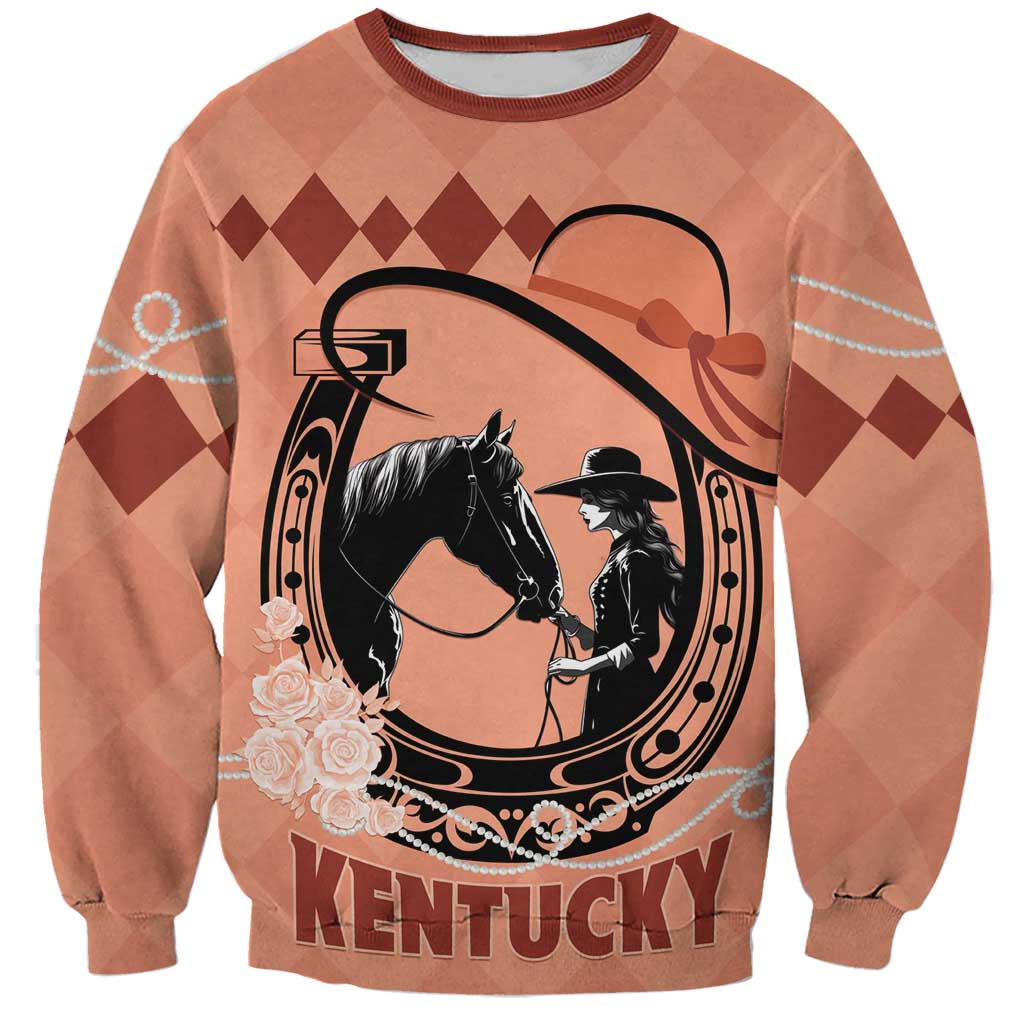 Orange sweatshirt with horse-and-rider graphic and 'KENTUCKY' text, crewneck.