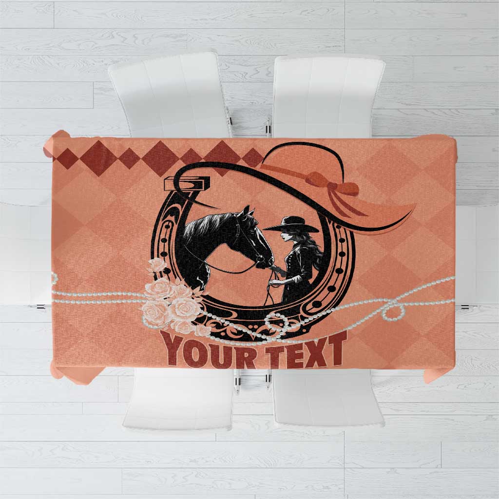 Orange personalized tablecloth with black horse medallion and 'YOUR TEXT' print