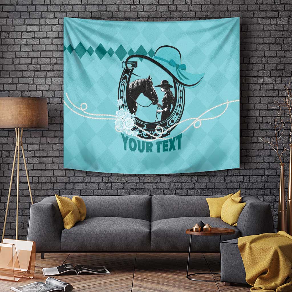 Teal rectangular tapestry with black horse and cowboy graphic, ornate oval border, 'YOUR TEXT'.