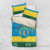 Rwanda bedding set in blue with coat of arms emblem and African geometric pattern, with pillowcases