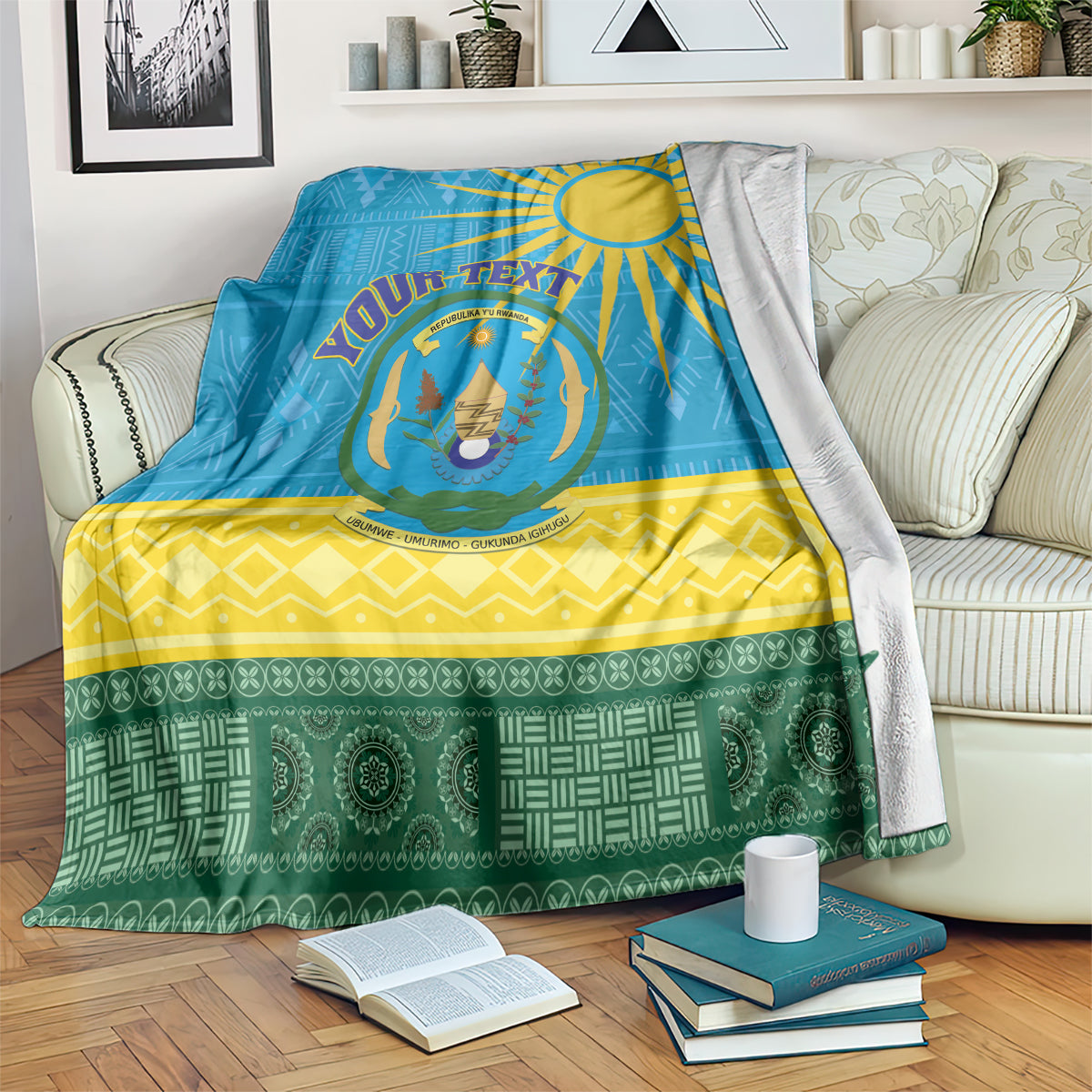Rwanda-themed blanket with blue, yellow, and green geometric pattern and crest emblem