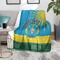 Rwanda-themed blanket with blue geometric design, sunburst corner, crest center, and green base