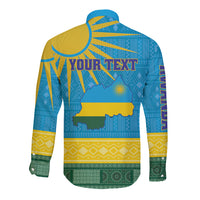 Long-sleeve button shirt, back view, yellow and blue African pattern with emblem