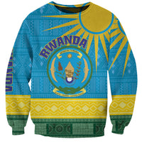 Blue sweatshirt with Rwanda crest, circular emblem, and African geometric pattern