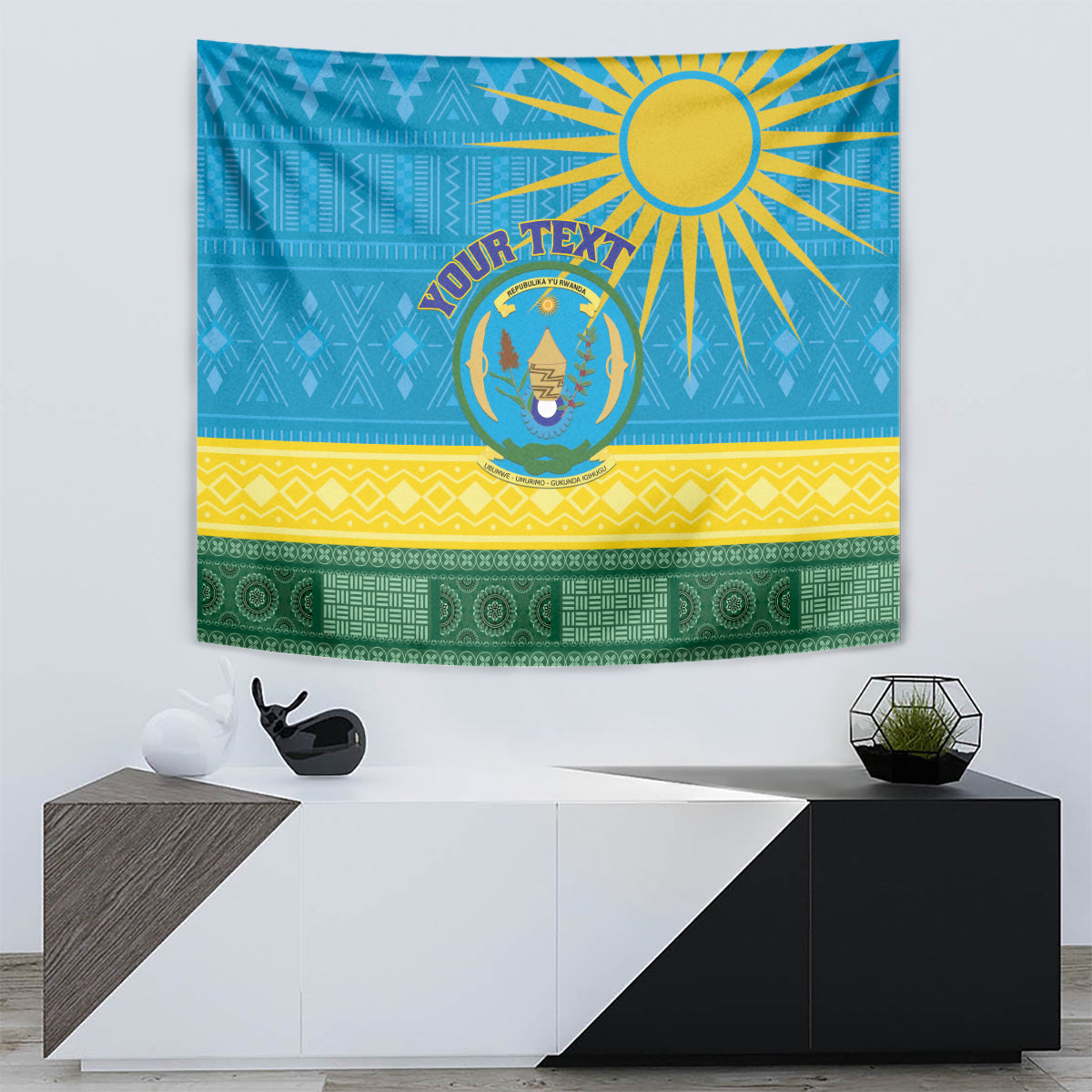 Blue Rwanda tapestry with sunburst rays, circular coat of arms, yellow band and green base