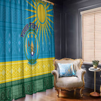 Rwanda-themed window curtain panels in blue with crest emblem, sunburst, and zigzag borders.