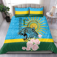 Bedding set in blue, yellow and green featuring leopard face and pink roses; 2 matching pillowcases
