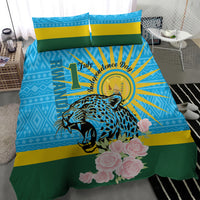Blue, yellow and green duvet cover with leopard and pink roses artwork; two pillowcases