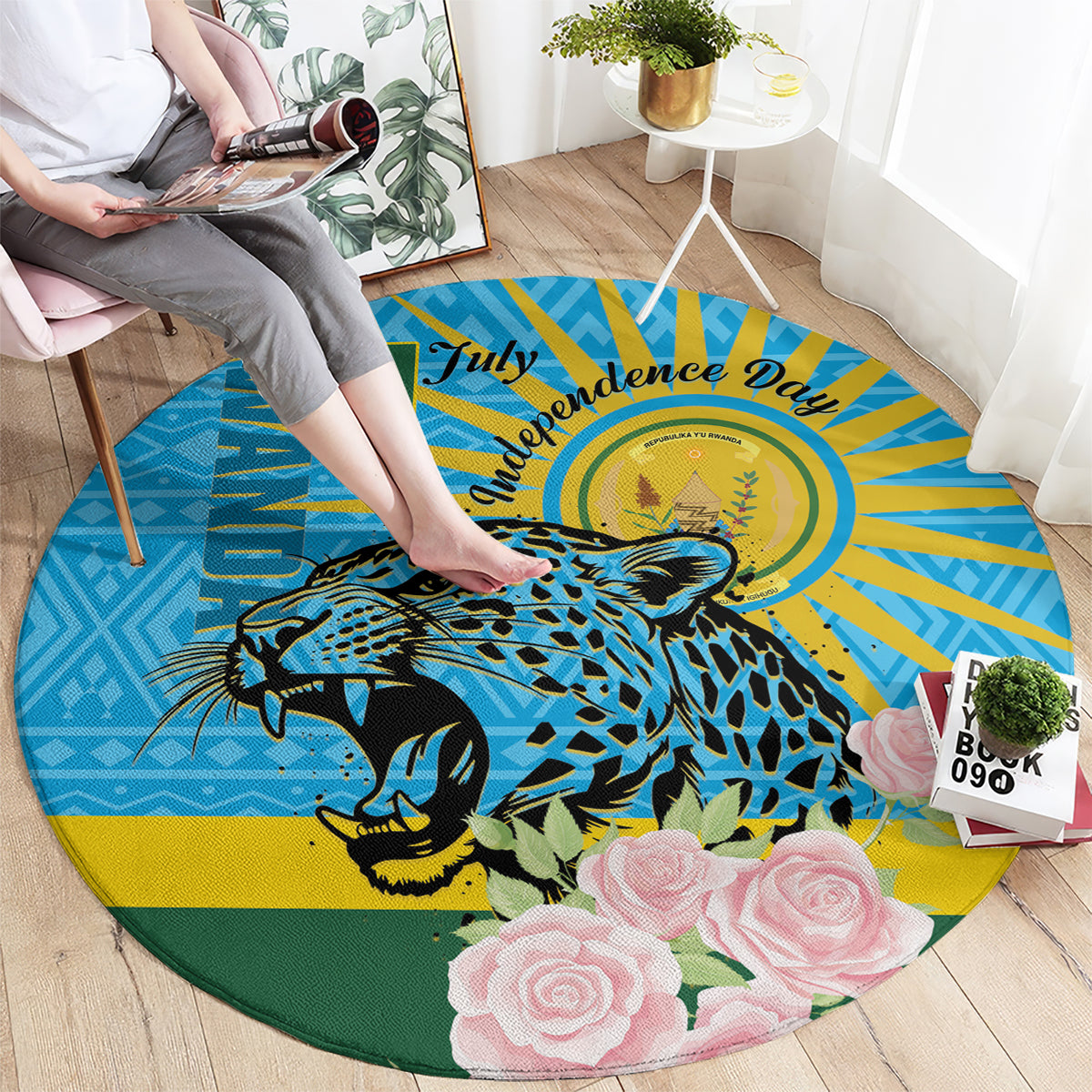 Round blue carpet with leopard illustration and pink roses, green edge