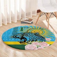 Round blue carpet with leopard graphic and pink rose bouquet print