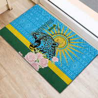 Blue rubber doormat featuring leopard and pink roses with sunburst emblem