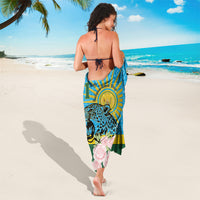 Blue sarong with leopard face, pink roses, and Rwanda independence emblem