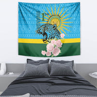 Independence Day tapestry with leopard artwork, gold rays, and clustered pink roses on blue and green.
