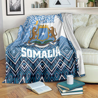 Blue patterned blanket with shield, star, and leopard figures for Somalia Independence Day