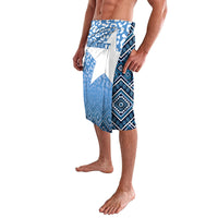 Blue patterned lavalava shorts with white graphic panel and diamond border