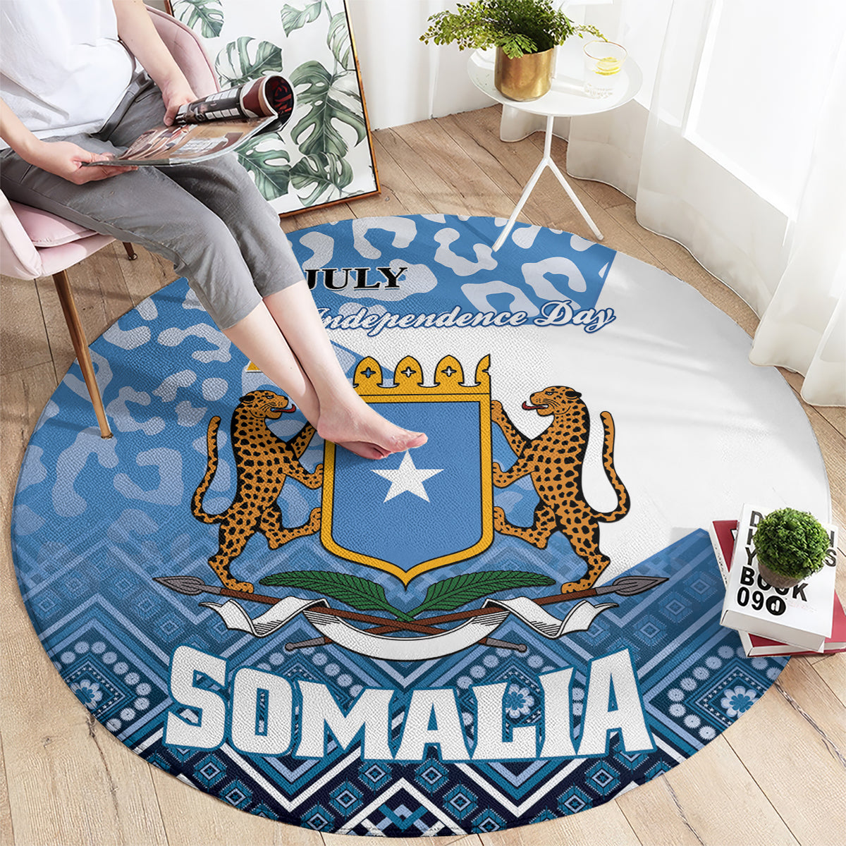 Round blue carpet with Somalia Independence Day design, shield star, leopard motifs