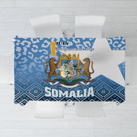 Blue Somalia Independence Day tablecloth with leopard-style figures and bold text