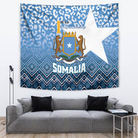 Blue Somalia independence tapestry with leopard pattern, crest, and SOMALIA text