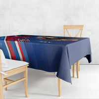 Blue Independence Day tablecloth with red-white stripes draped over table