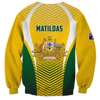 Australia soccer sweatshirt in yellow with green panels, MATILDAS text on back