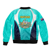 Unisex turquoise bomber jacket with back MATILDAS print and crest, ribbed collar and cuffs