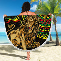 Lion-themed round beach blanket with colorful geometric bands and white fringe, black center