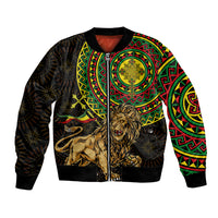 Black bomber jacket with colorful Ethiopian-style patterns and gold lion art