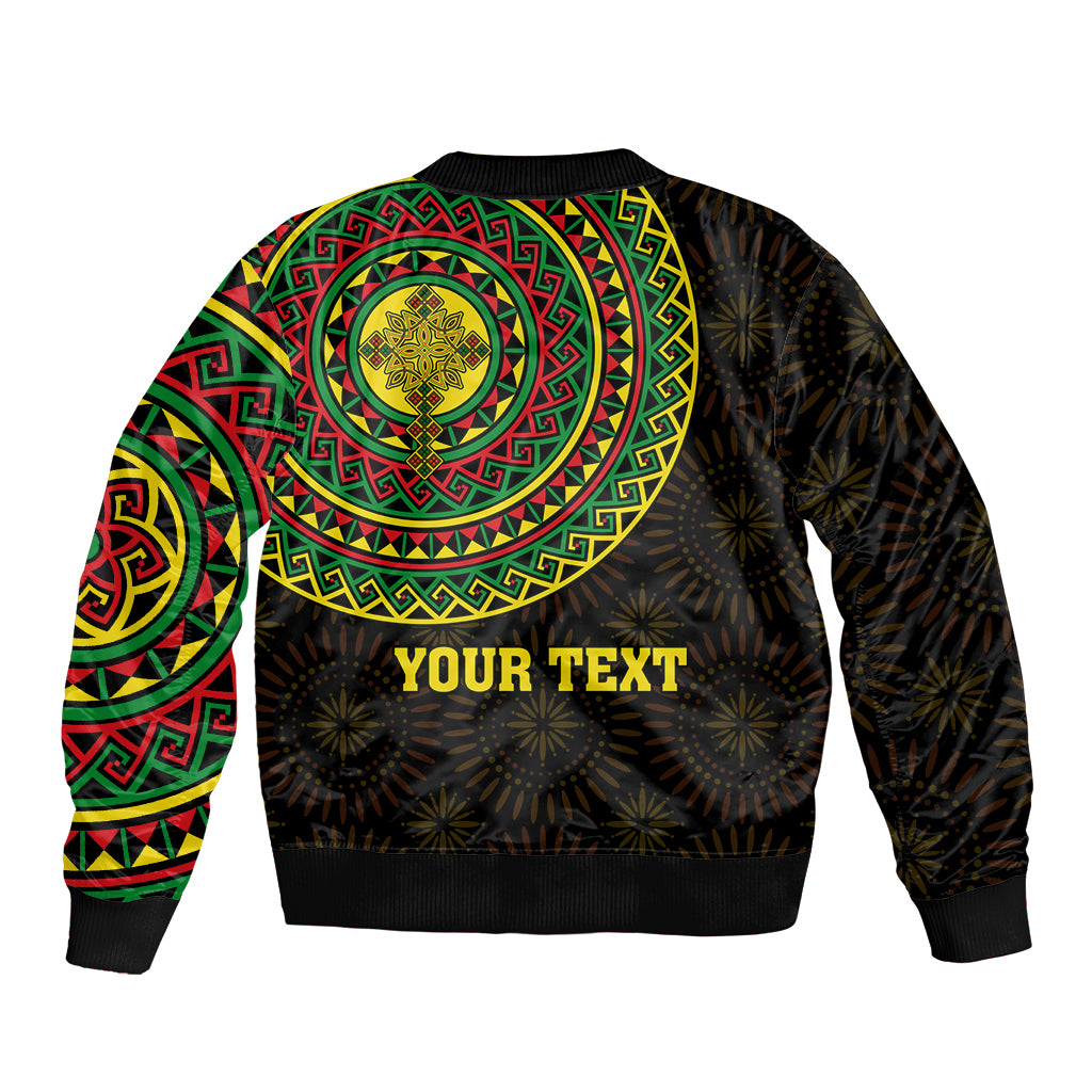 Black bomber jacket with green red yellow circular pattern and gold lion graphic, YOUR TEXT