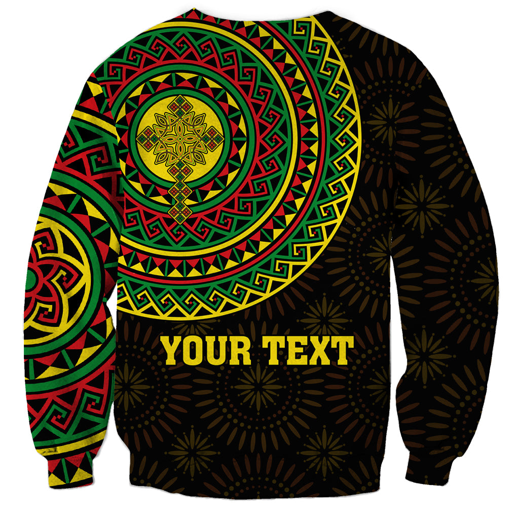 Unisex black sweatshirt back with green-red mandala pattern, starburst accents, 'YOUR TEXT'