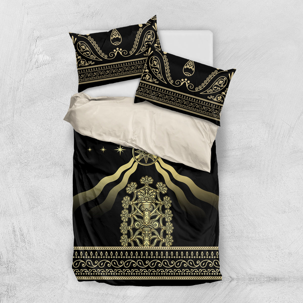 Black duvet and two pillowcases with gold central crest and symmetrical ornate trim