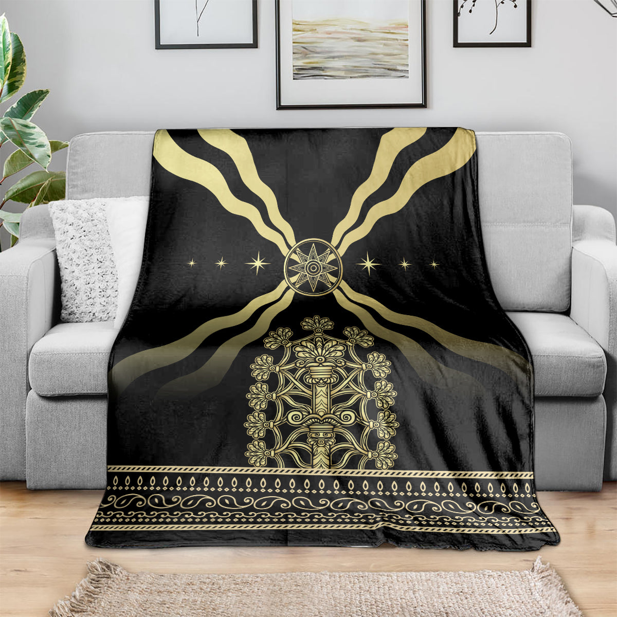 Black and gold patterned mythological blanket draped over sofa with central throne emblem